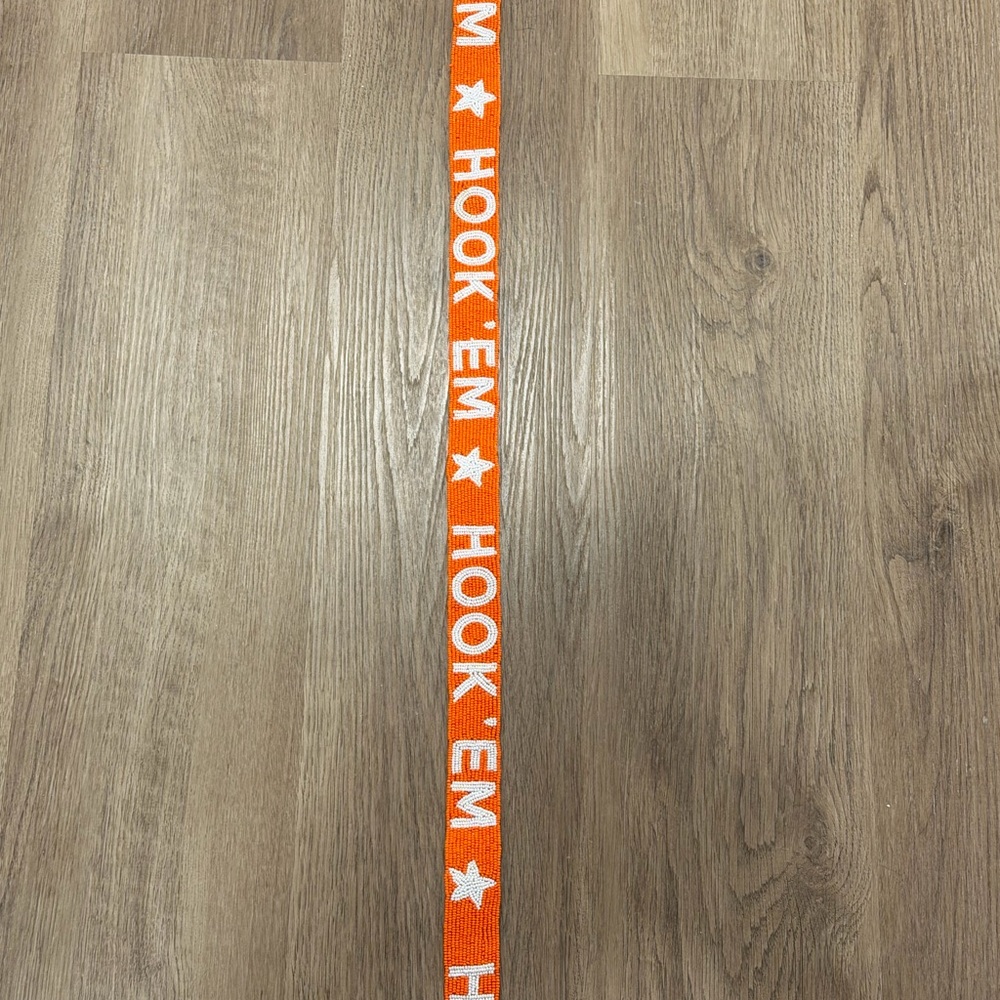 Orange Hook 'Em Horns Game Day beaded handbag strap.